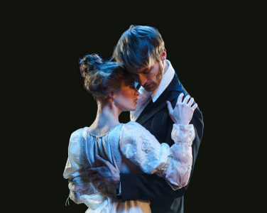 masking curtain behind a couple embracing on a stage